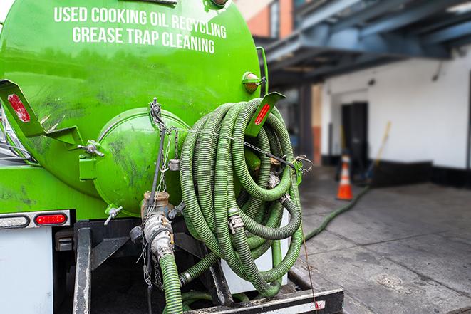 suction truck pumping grease trap for disposal in Bonney Lake